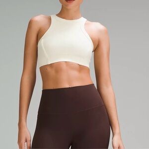 Lululemon Ribbed Nulu High-Neck Yoga Bra
Light Support SZ 10 color light gray